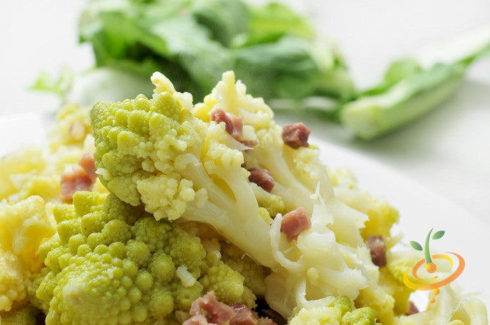 Romanesco broccoli seeds from SeedsNow, fresh green Romanesco broccoli head with intricate fractal patterns.