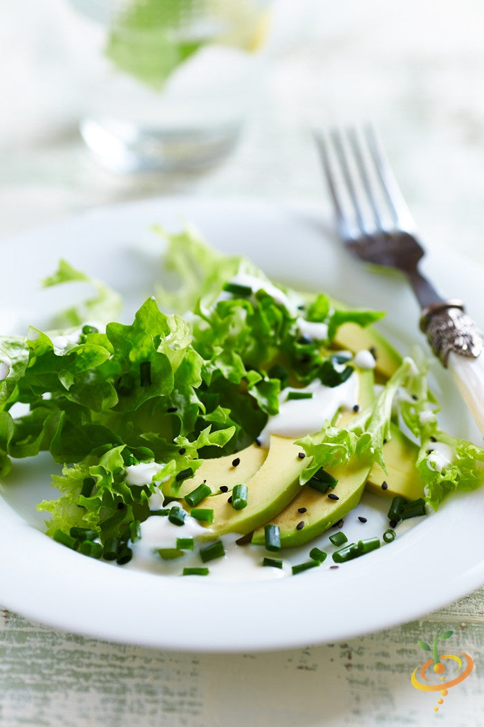 Fresh green Tango lettuce leaves from SeedsNow, showcasing vibrant, crisp lettuce heads ideal for salads and sandwiches.
