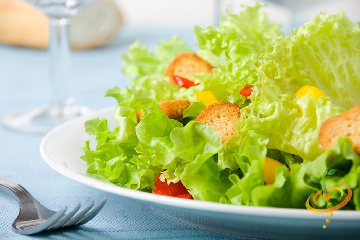 Blonde de Paris lettuce seeds by SeedsNow, close-up of fresh lettuce leaves with vibrant green and tender texture.