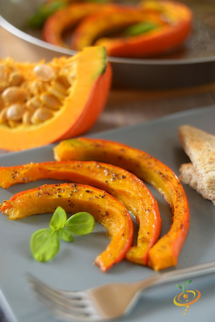 Red Kuri winter squash seeds from SeedsNow, shown in a clear image with vibrant orange-red squash and seed packets.